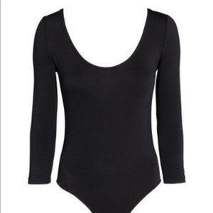 Brand new w/ tags. 3/4 sleeve Scoop neck bodysuit.